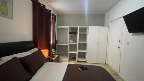 Bonita y amplia habitación cerca del WTC